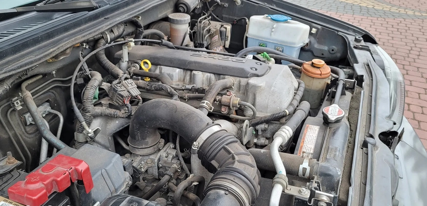 Suzuki Jimny cena 32900 przebieg: 146000, rok produkcji 2006 z Międzyzdroje małe 704